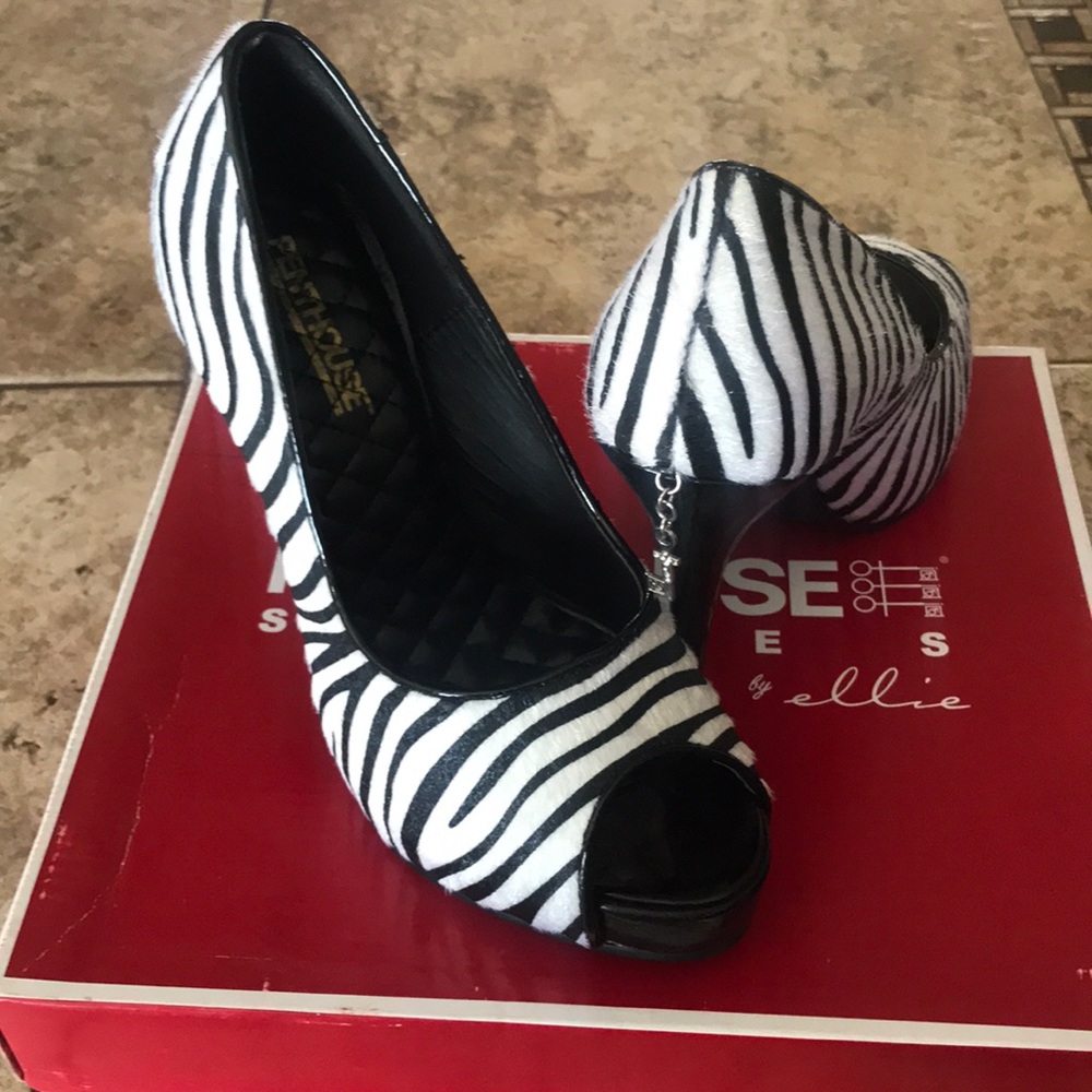 Penthouse zebra print stilettos.